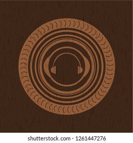 headphones icon inside wood emblem. Retro