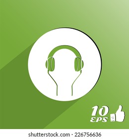 Headphones icon on the background. Made in vector