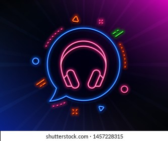 Headphones line icon. Neon laser lights. Music listening device sign. DJ or Audio symbol. Glow laser speech bubble. Neon lights chat bubble. Banner badge with headphones icon. Vector