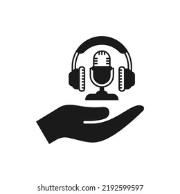 Headphones and mic on hand icon flat style isolated on white background. Vector illustration