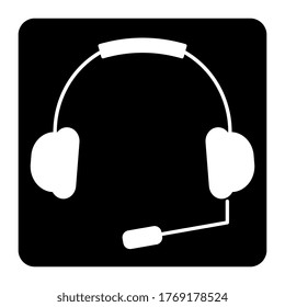 Headphones With A Microphone Headset Icon on black background,flat design