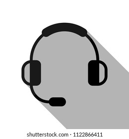 Headphones with microphone. Support service. Simple icon. Black object with long shadow on white background