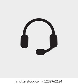 headphones with microphone. vector icon