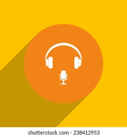 Headphones. Musical accessory. on an orange background with shadow, vector, EPS 10