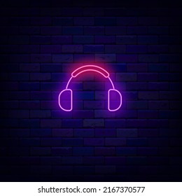 Headphones Neon Icon. Acoustic Equipment. Record Studio. Music Store. Shiny Sign On Brick Wall. Editable Stroke. Glowing Effect Emblem. Vector Stock Illustration