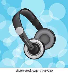 Headphones on blue circular glowing background