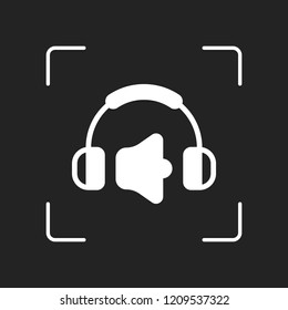 Headphones and volume level. Max volume level. Simple icon. White object in camera autofocus on dark background