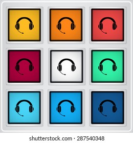 Headset with a microphone icon. Flat design style. Made in vector. Emblem or label with shadow.