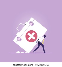 Health care costs or medical insurance concept, Businessman carrying big Medical box as Costly expensive pricey medical insurance