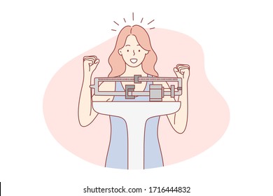 Health, diet, weight, goal achievement, success concept. Young happy woman girl stand on scale delighted to lose excess kilogramms on diet. Reaching purpose and winning or accomplishment.