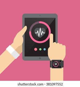 Health monitoring smartphone app on tablet and smart watch in hand 