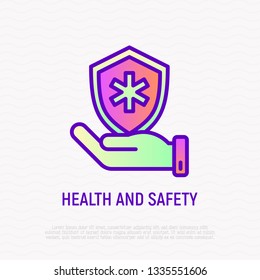 Health and safety thin line icon: hand holding shield with medical symbol. Modern vector illustration.