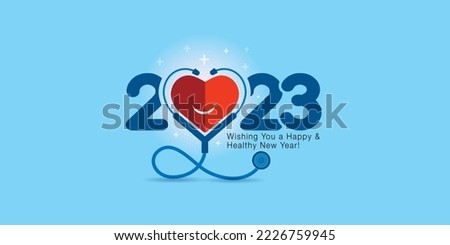 Healthcare clinic concept and creative for 2023 new year. Doctor stethoscope with smiling heart and blue background.