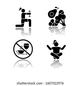 Healthcare drop shadow black glyph icons set. Physical exercise. Vitamin intake, vegetables. Alcohol and caffeine refusal. Meditation, yoga practice. Fitness and workout. Isolated vector illustrations