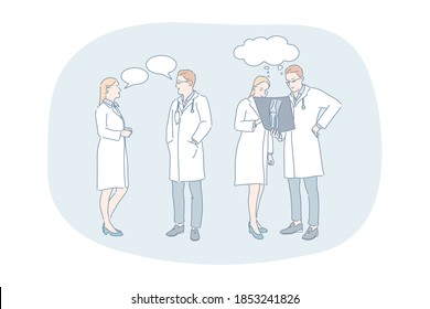 Healthcare, medicine, medicare, doctors communication and discussion concept. Young woman and man doctors in white medical uniform standing and having discussion about patients injury together