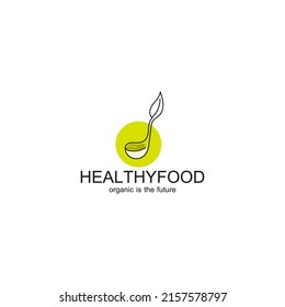 healthy food logo concept with a leaf symbol and a spoon or cutlery icon. Simple with iconic lines. Can be used for healthy food products, restaurants or vegan food