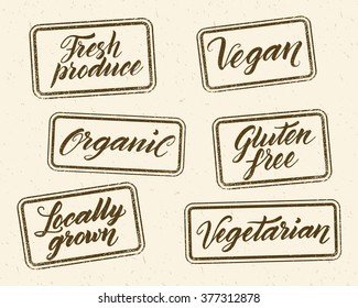 Healthy food stamps with hand drawn letterings against recycled paper background. Layered vector illustration, can be placed on any background you like.