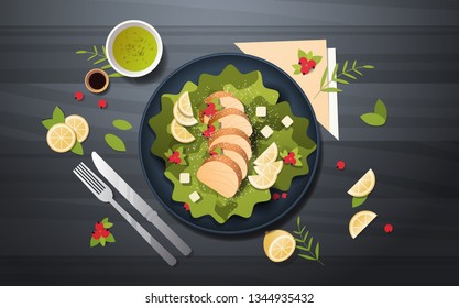 healthy fresh vegetable salad with chicken and sauce in black bowl  