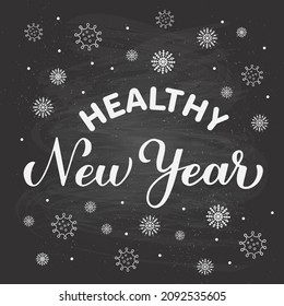 Healthy New Year calligraphy lettering on chalkboard background. Funny pandemic quote. Holidays typography poster. Vector template for banner, greeting card, etc. 
