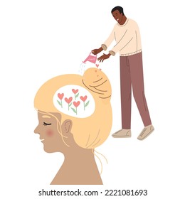 Healthy relationship between a man and a woman concept. A man takes care of a woman's mental health. Man with watering can irrigates blossom flowers inside head. Love inside a woman