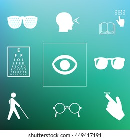 healthy vision icons / eye problems and vision tests with glasses and lenses on blurred background