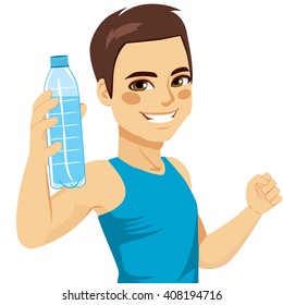 Healthy young man showing bottle of mineral water smiling happy