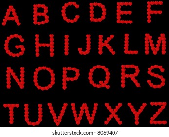 Heart alphabet on the black background