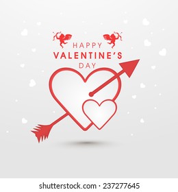 Heart with arrow for Happy Valentine's Day celebration on shiny grey love background.