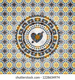 heart with arrow icon inside arabesque style emblem. arabic decoration.