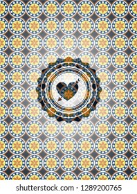 heart with arrow icon inside arabesque emblem. arabic decoration.