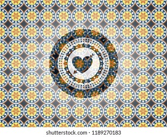heart with arrow icon inside arabic badge background. Arabesque decoration.