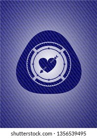 heart with arrow icon inside badge with jean texture