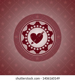 heart with arrow icon inside badge with red background