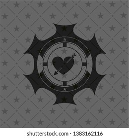 heart with arrow icon inside black emblem