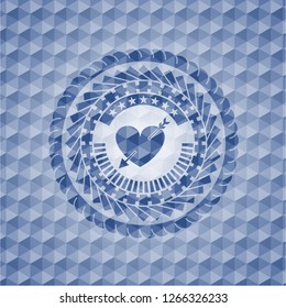 heart with arrow icon inside blue badge with geometric pattern background.