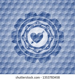 heart with arrow icon inside blue emblem or badge with abstract geometric polygonal pattern background.