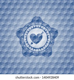 heart with arrow icon inside blue polygonal badge.