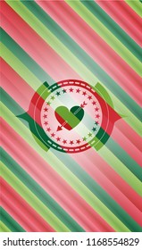 heart with arrow icon inside christmas colors style emblem.