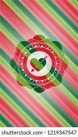heart with arrow icon inside christmas colors style emblem.