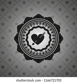heart with arrow icon inside dark emblem. Retro