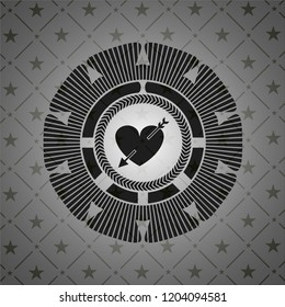 heart with arrow icon inside dark badge