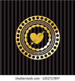 heart with arrow icon inside gold shiny emblem