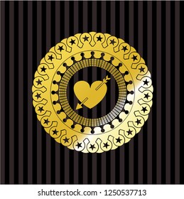 heart with arrow icon inside golden badge or emblem