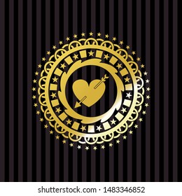 heart with arrow icon inside golden badge