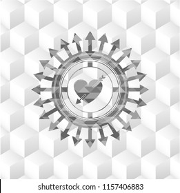 heart with arrow icon inside grey icon or emblem with geometric cube white background