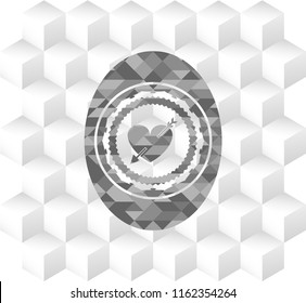 heart with arrow icon inside grey emblem with cube white background