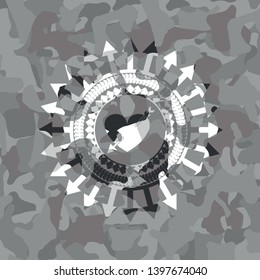 heart with arrow icon inside grey camouflage emblem