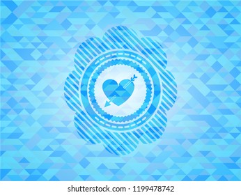 heart with arrow icon inside light blue mosaic emblem