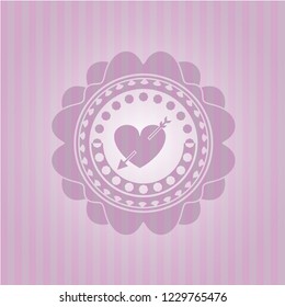 heart with arrow icon inside pink emblem