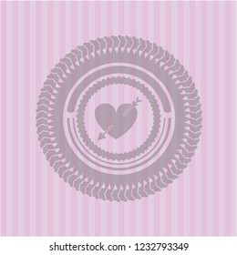 heart with arrow icon inside realistic pink emblem
